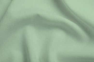 Image of Sage color fabric as background, top view