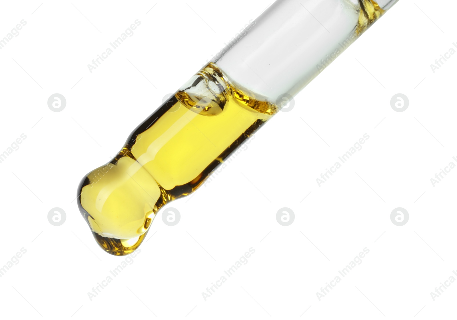 Photo of Dripping essential oil from pipette on white background