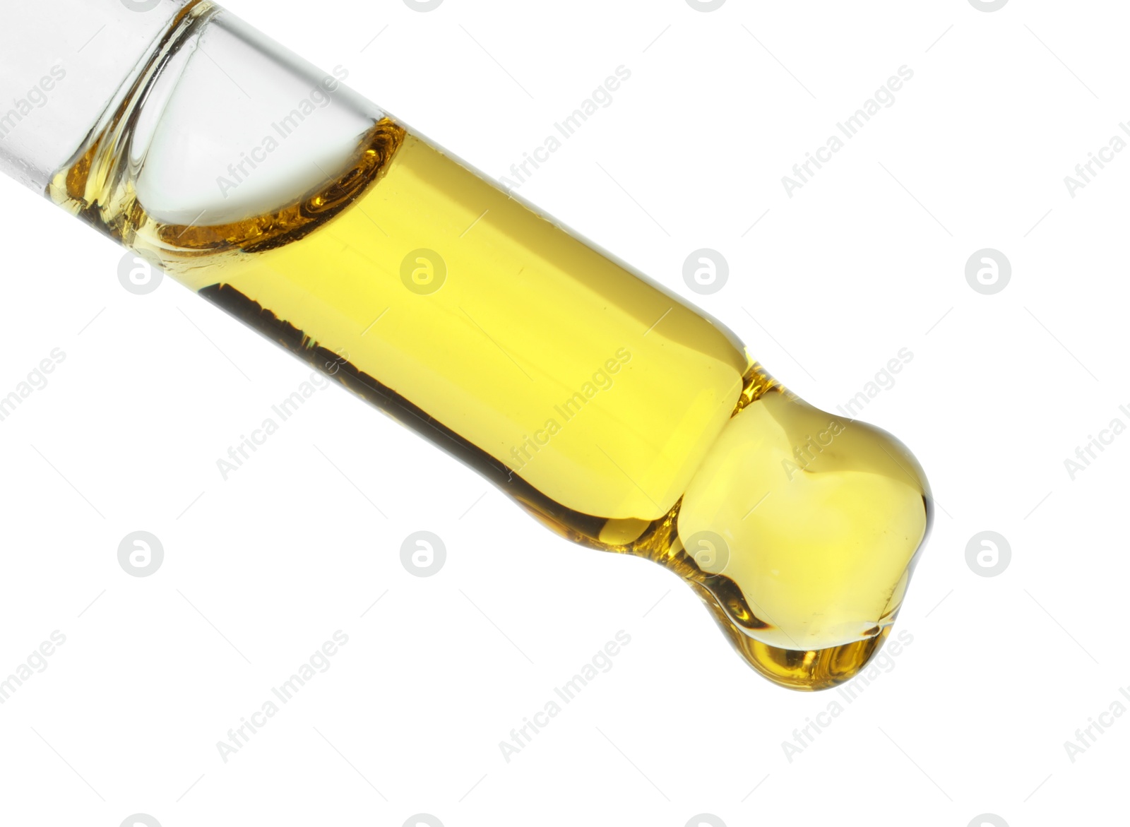 Photo of Dripping essential oil from pipette on white background