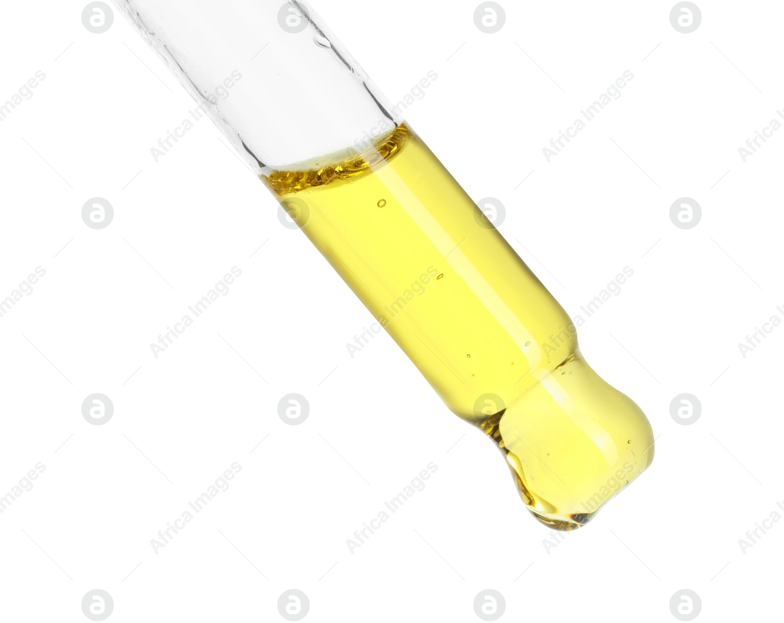 Photo of Dripping essential oil from pipette on white background