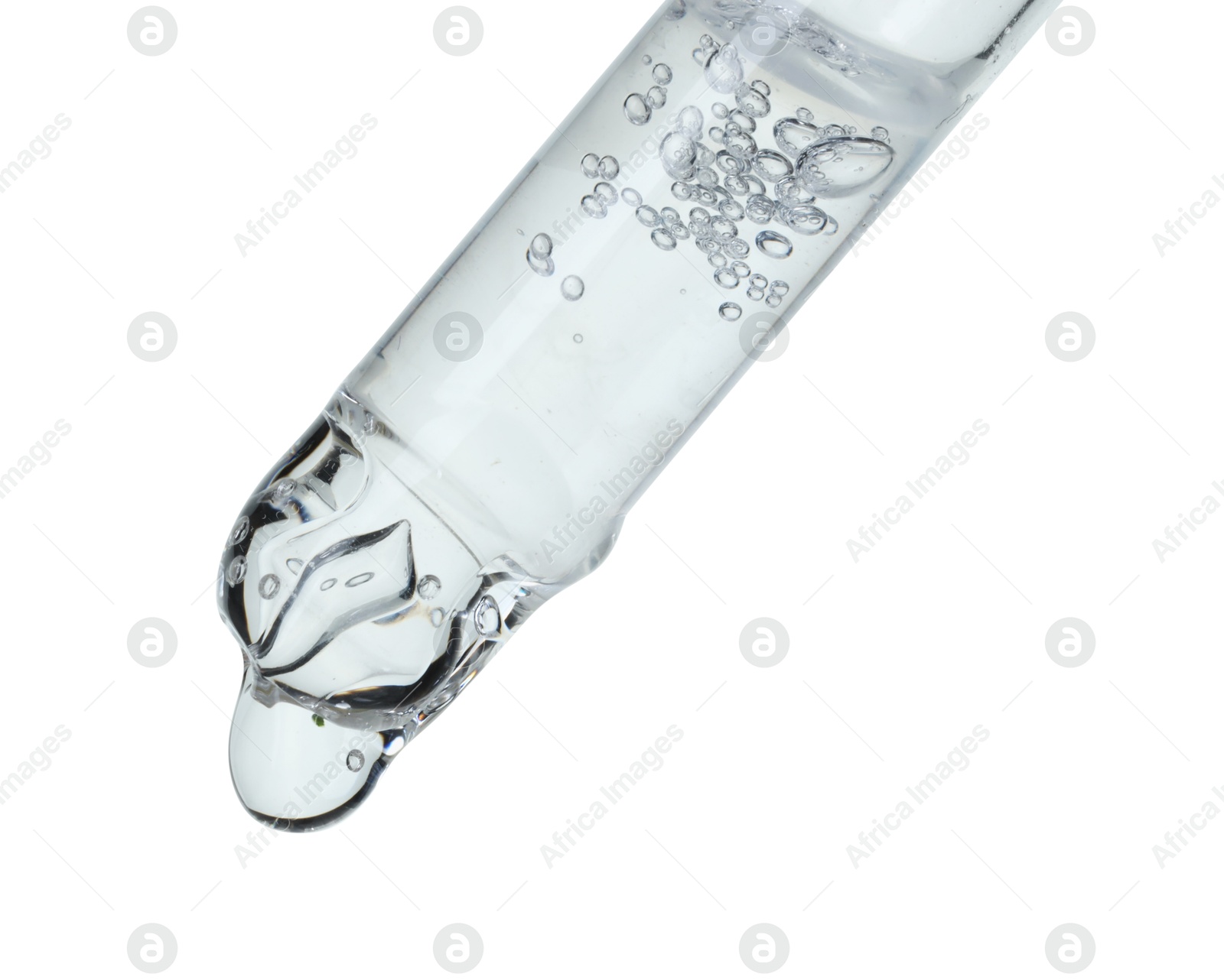 Photo of Dripping cosmetic serum from pipette on white background