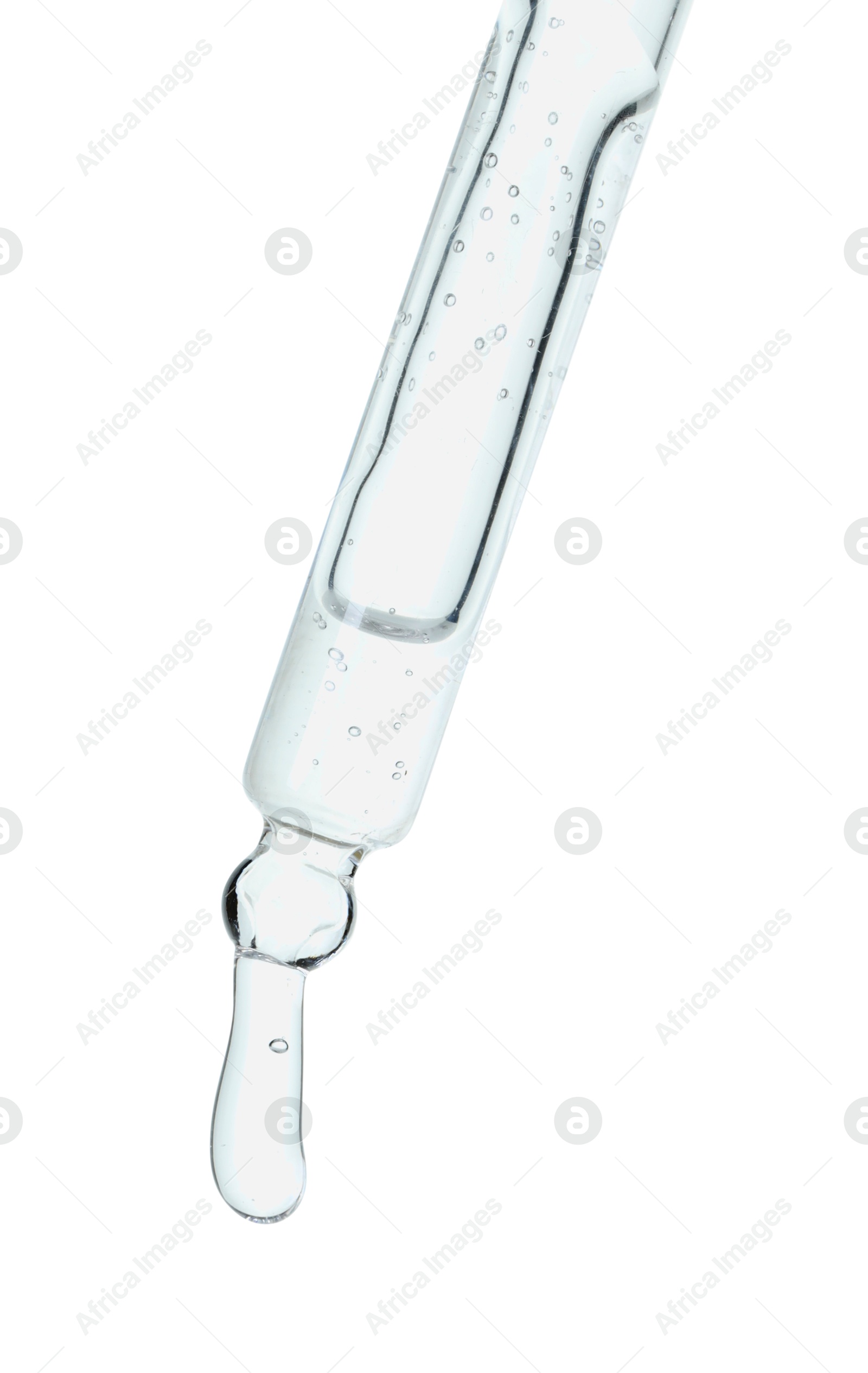 Photo of Dripping cosmetic serum from pipette on white background