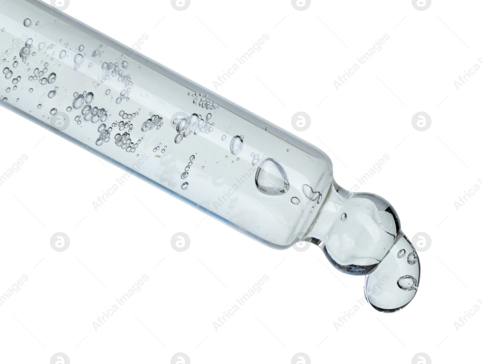 Photo of Dripping cosmetic serum from pipette on white background