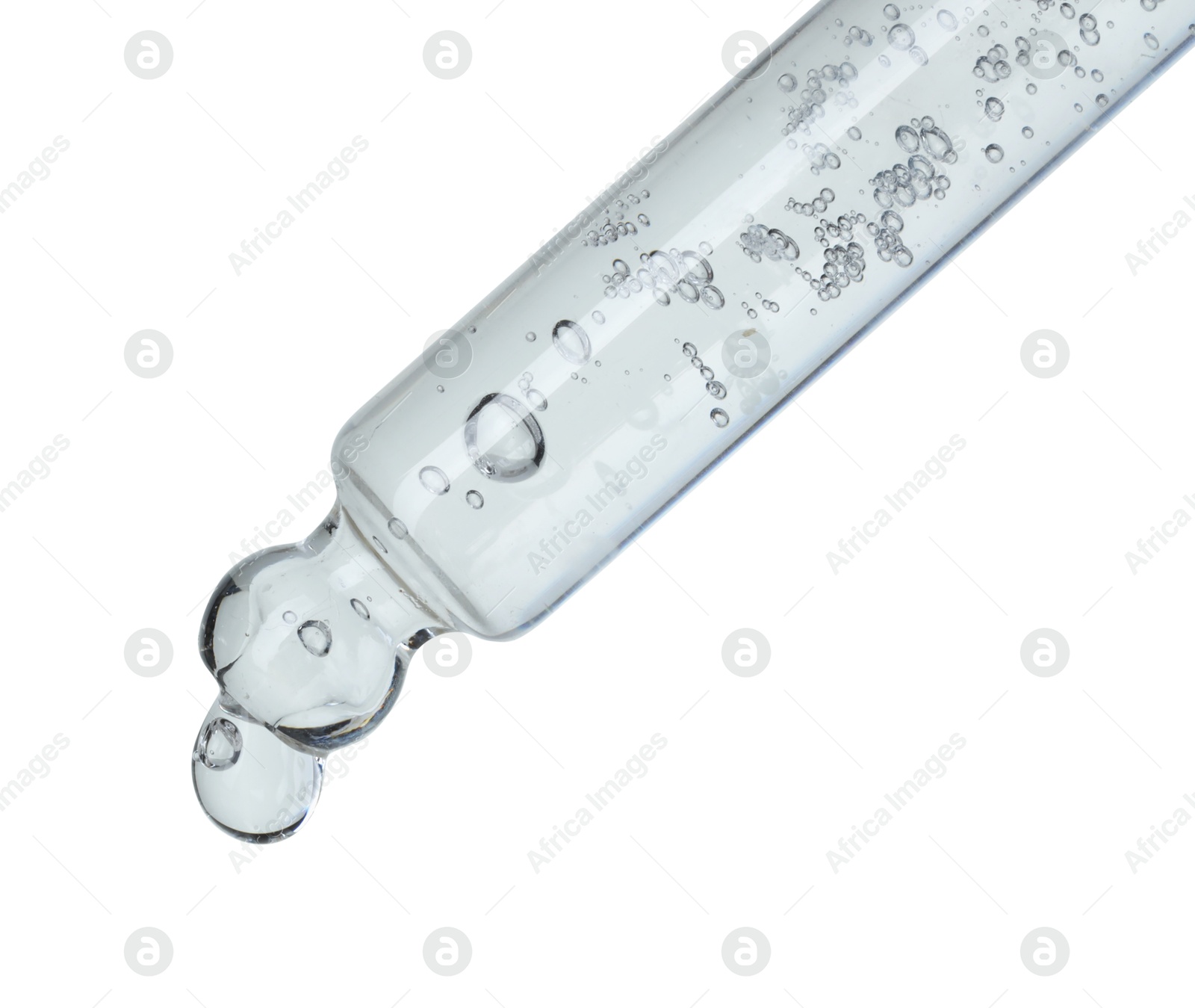 Photo of Dripping cosmetic serum from pipette on white background