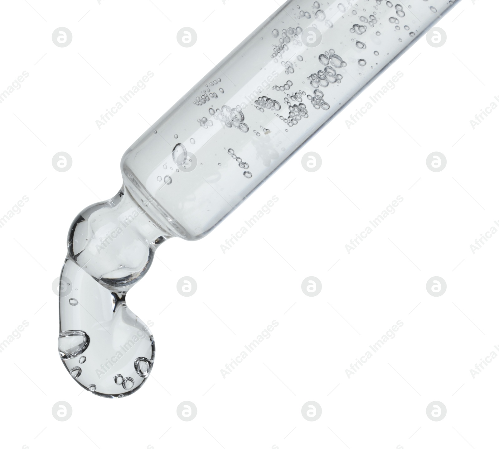 Photo of Dripping cosmetic serum from pipette on white background