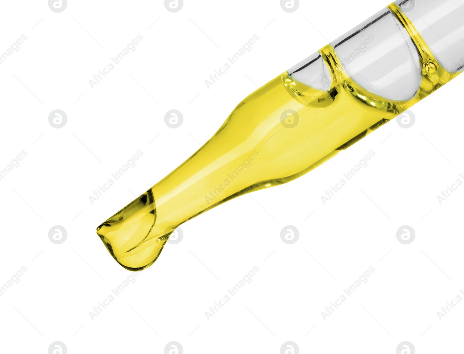 Photo of Dripping essential oil from pipette on white background