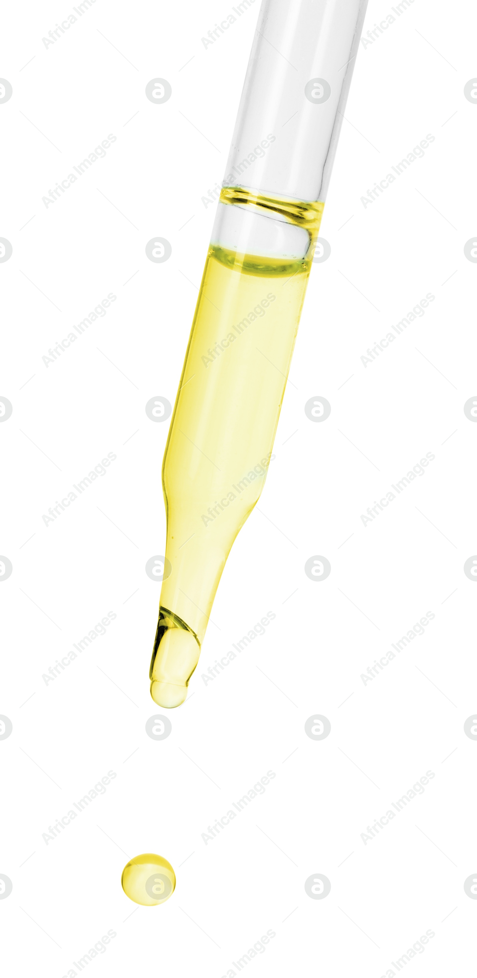 Photo of Dripping essential oil from pipette on white background