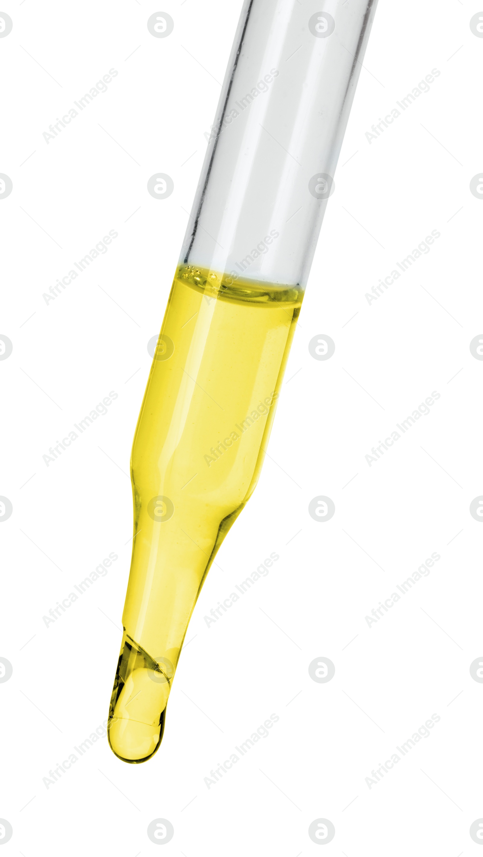 Photo of Dripping essential oil from pipette on white background