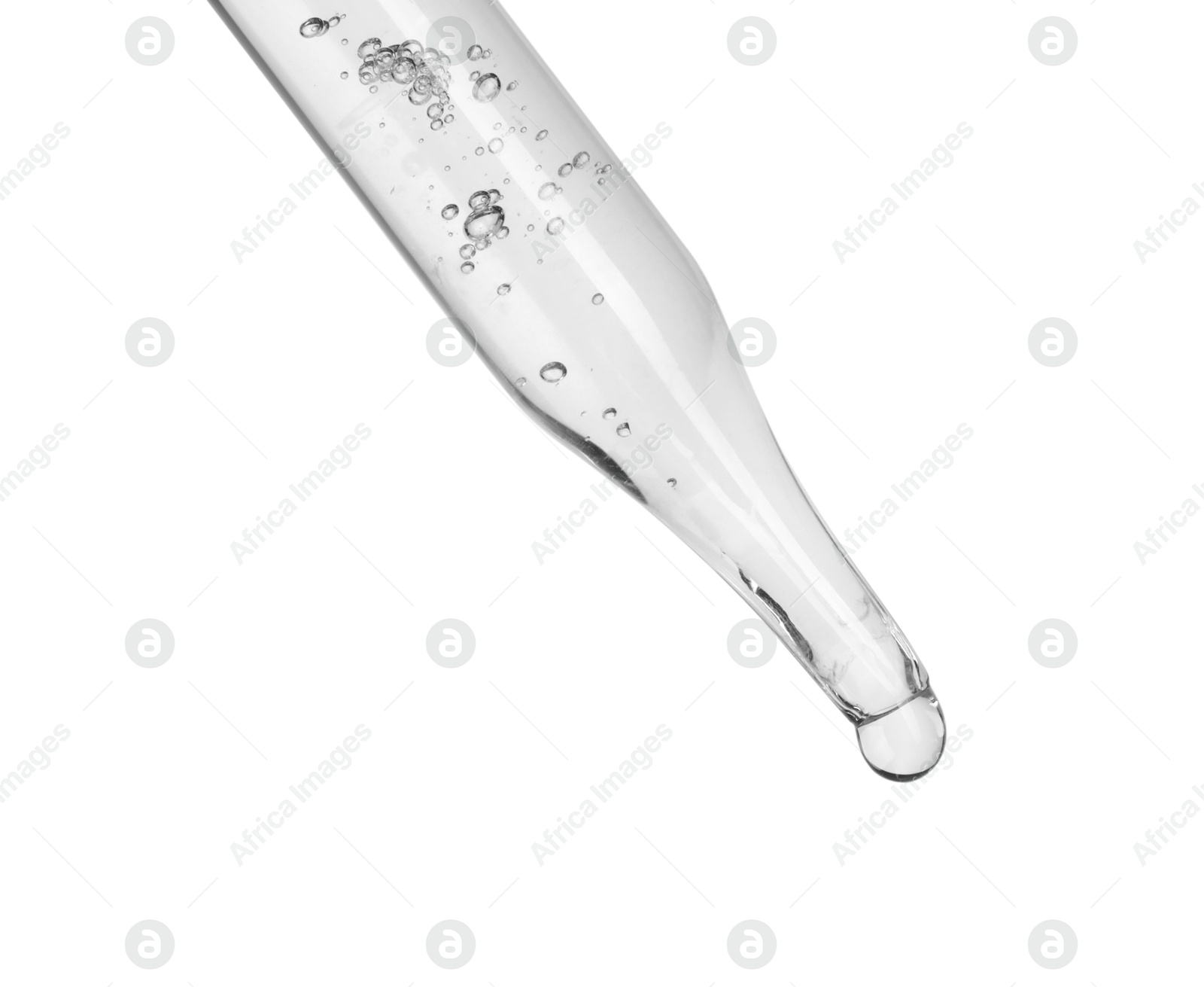 Photo of Dripping cosmetic serum from pipette on white background