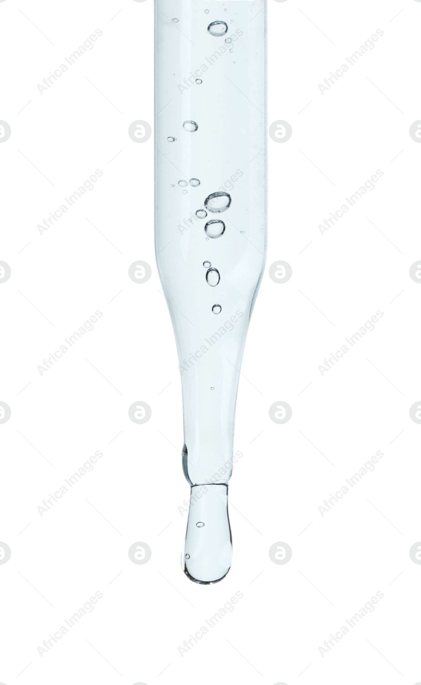 Photo of Dripping cosmetic serum from pipette on white background