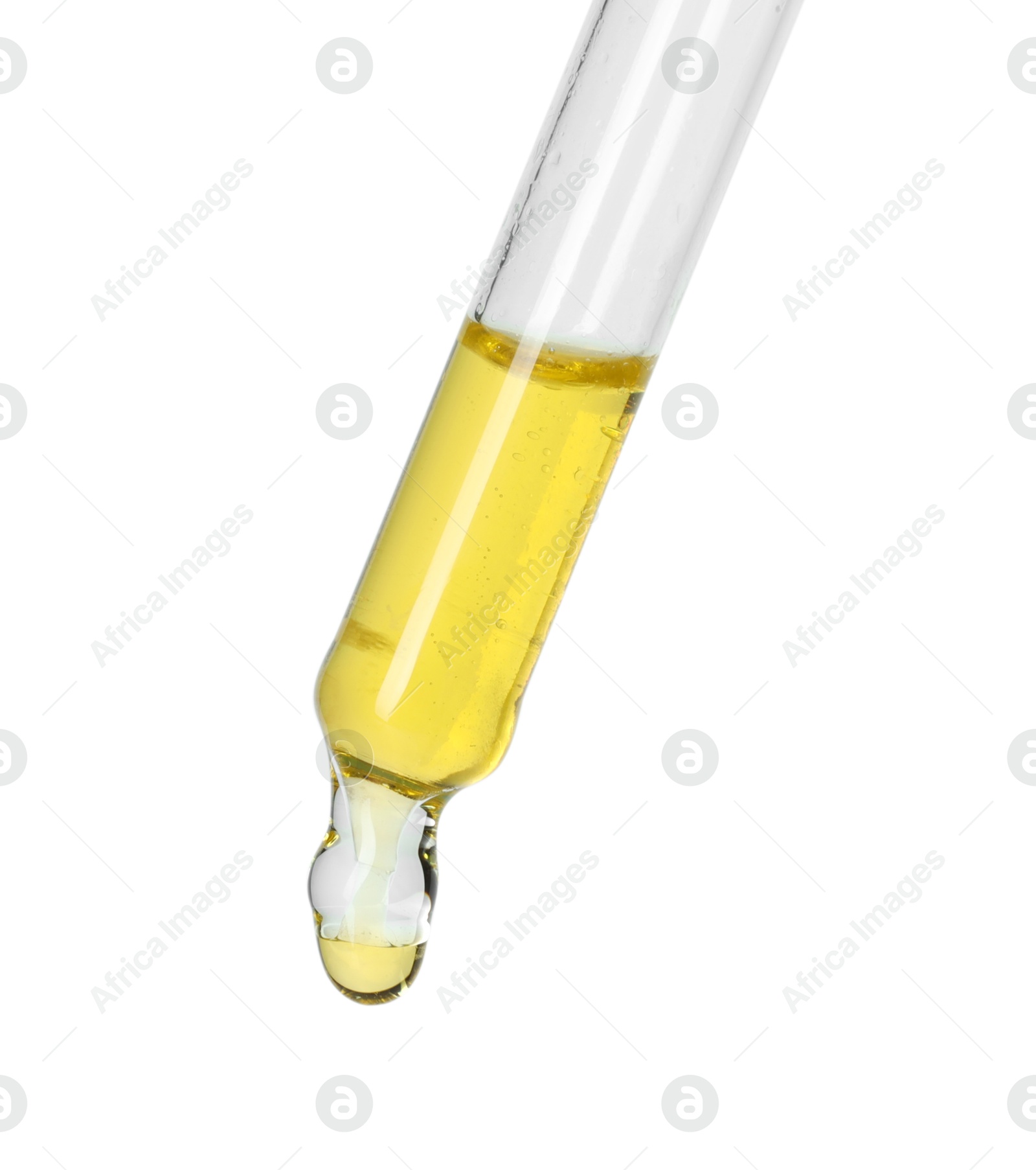 Photo of Dripping essential oil from pipette on white background