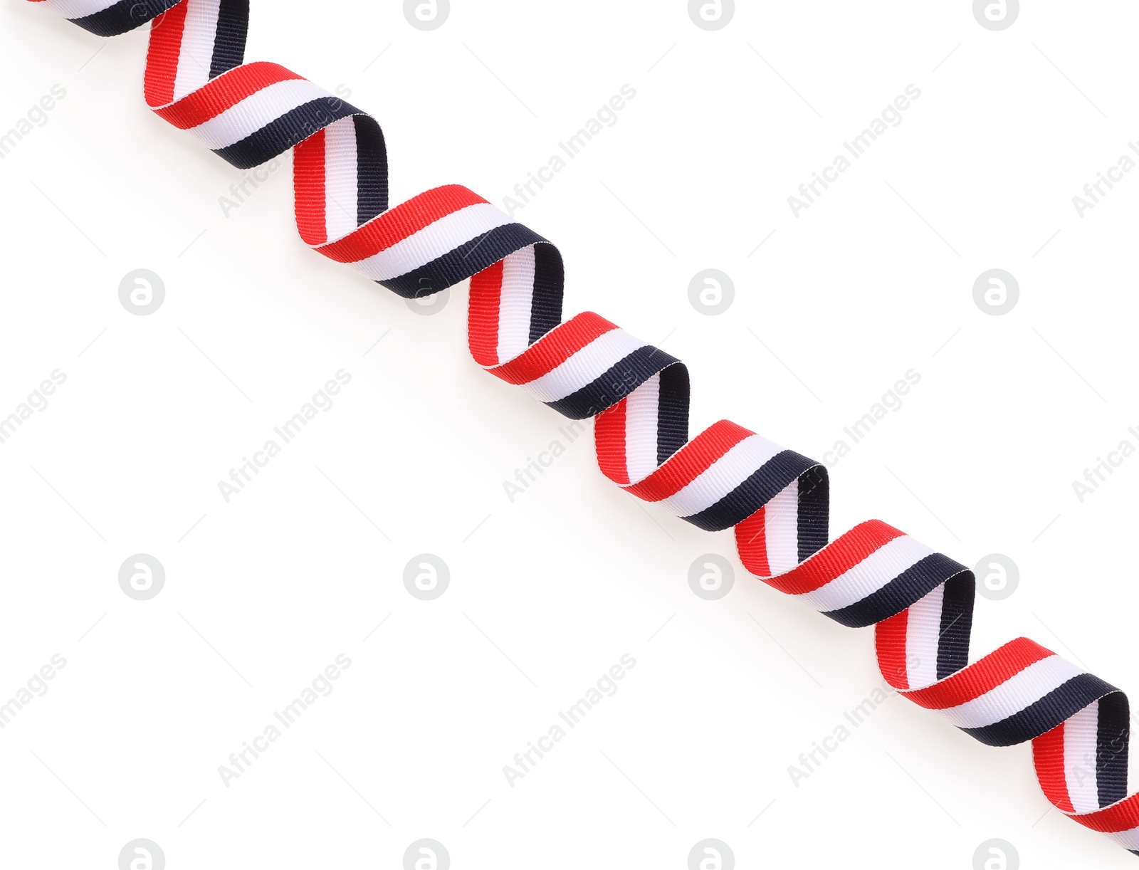 Photo of Ribbon in colors of Yemeni flag isolated on white, top view