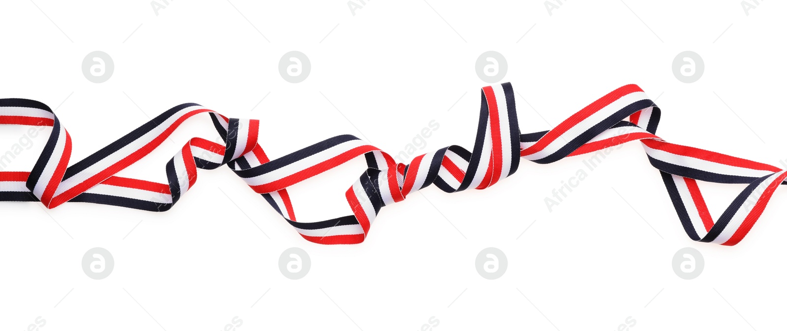 Photo of Ribbon in colors of Yemeni flag isolated on white, top view