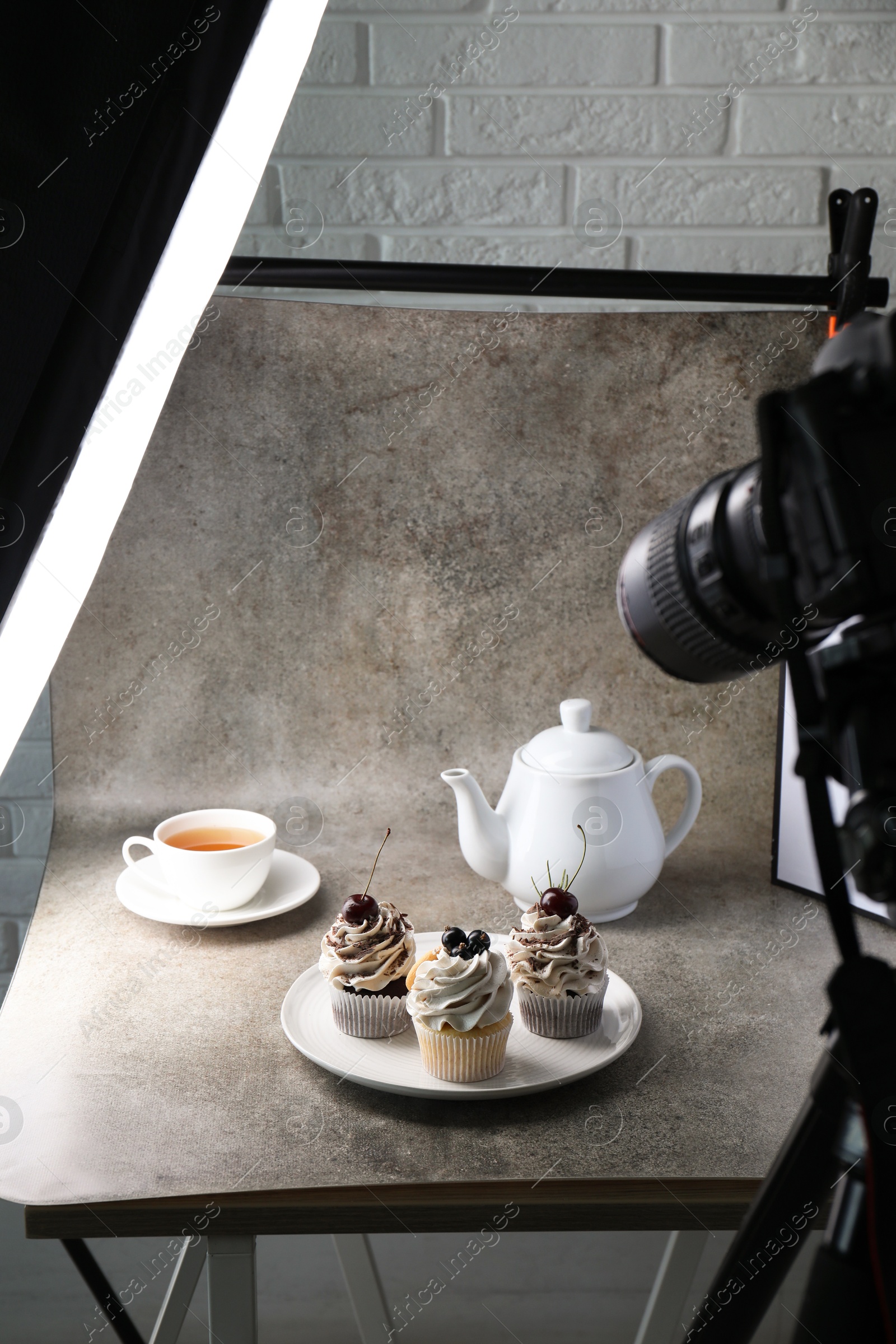 Photo of Shooting food in photo studio with professional lighting equipment