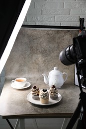 Shooting food in photo studio with professional lighting equipment