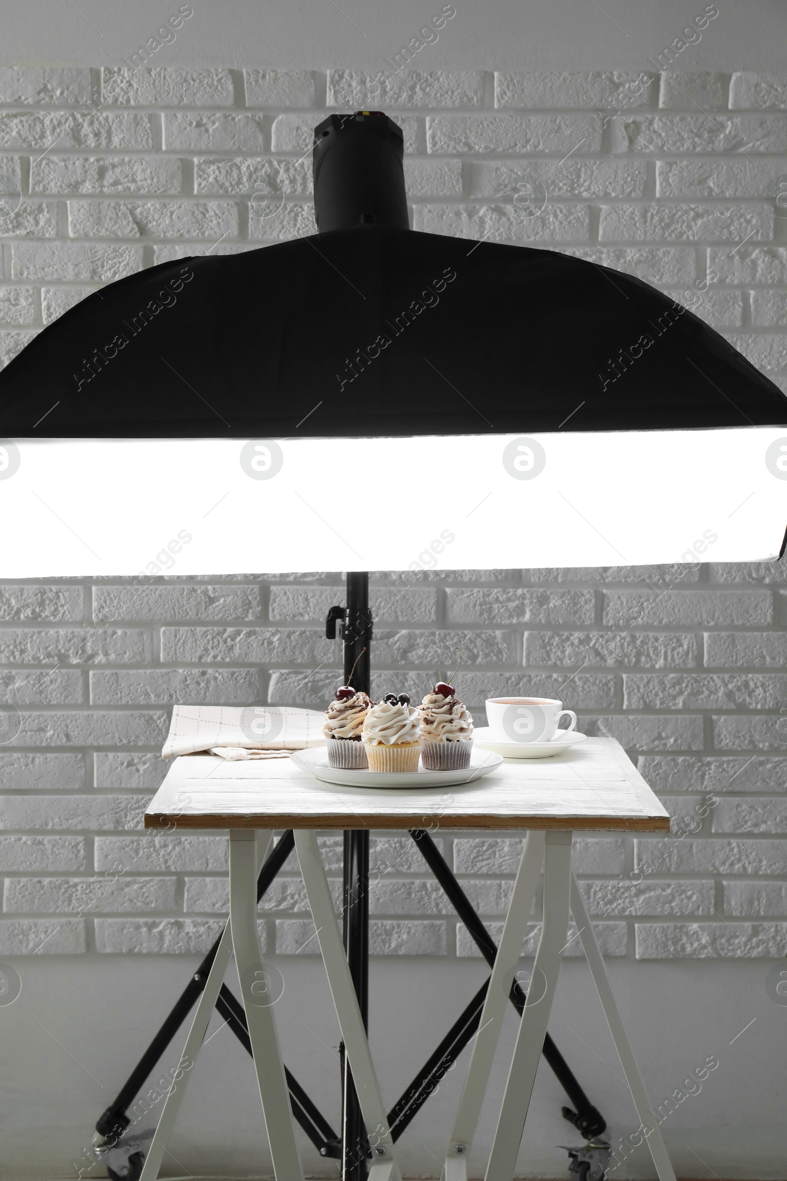 Photo of Shooting food in photo studio with professional lighting equipment