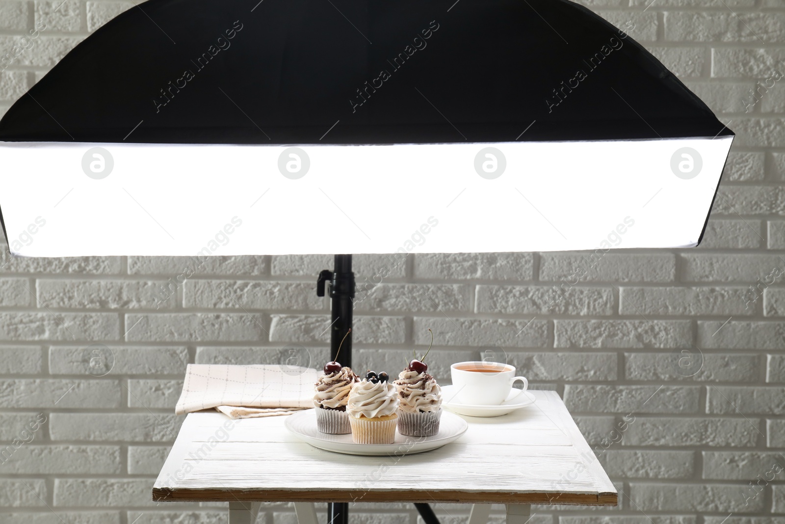 Photo of Shooting food in photo studio with professional lighting equipment