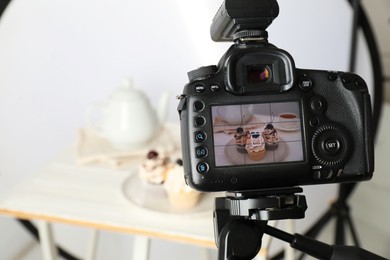 Photo of Shooting food with professional camera in photo studio, selective focus