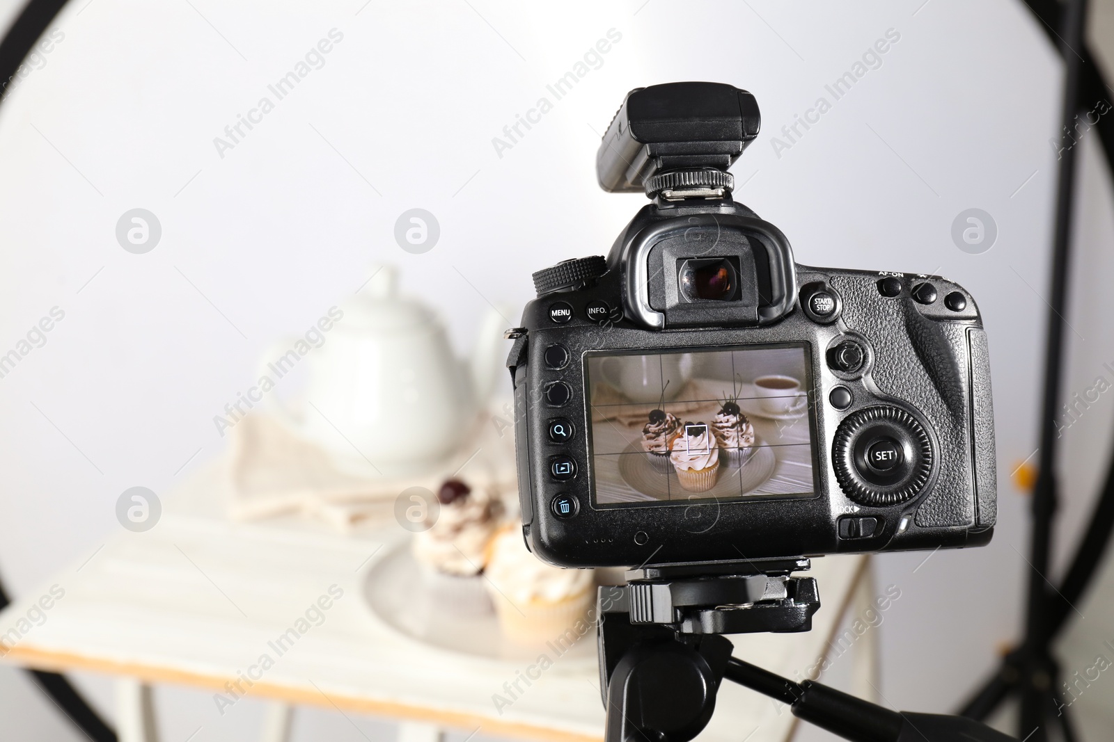 Photo of Shooting food with professional camera in photo studio, selective focus