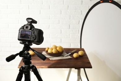 Shooting food in photo studio with professional equipment