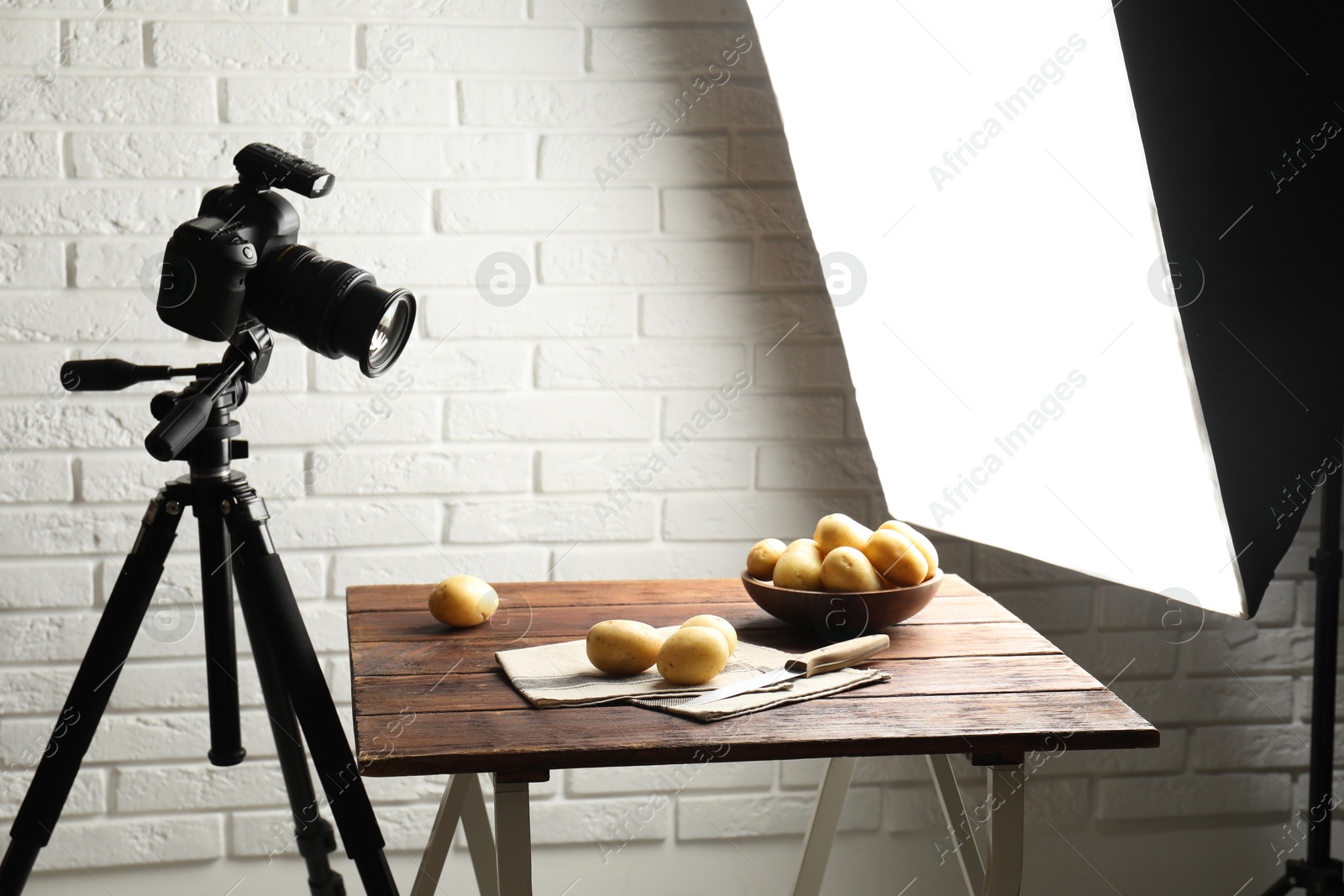 Photo of Shooting food in photo studio with professional lighting equipment