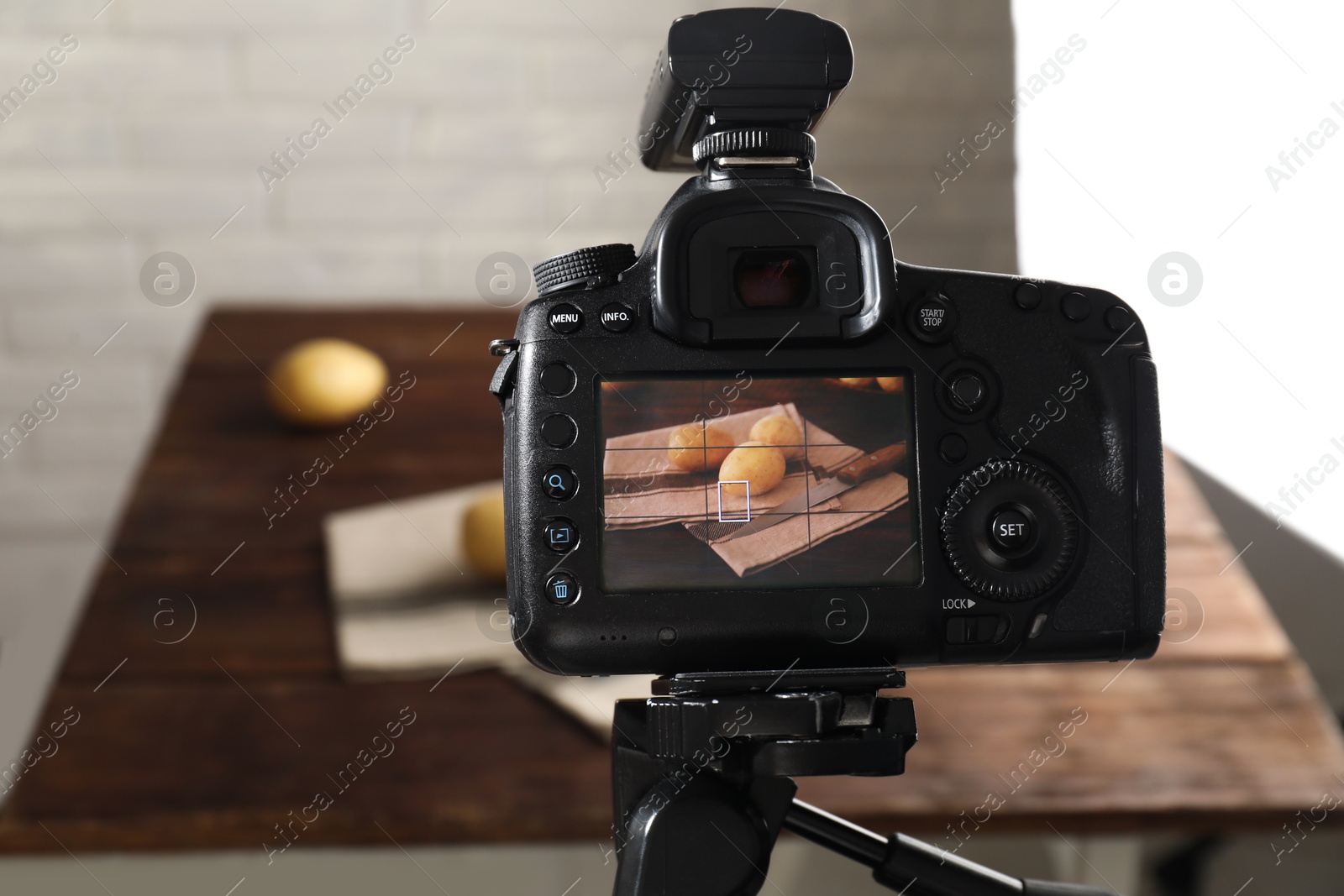 Photo of Shooting food with professional camera in photo studio, selective focus