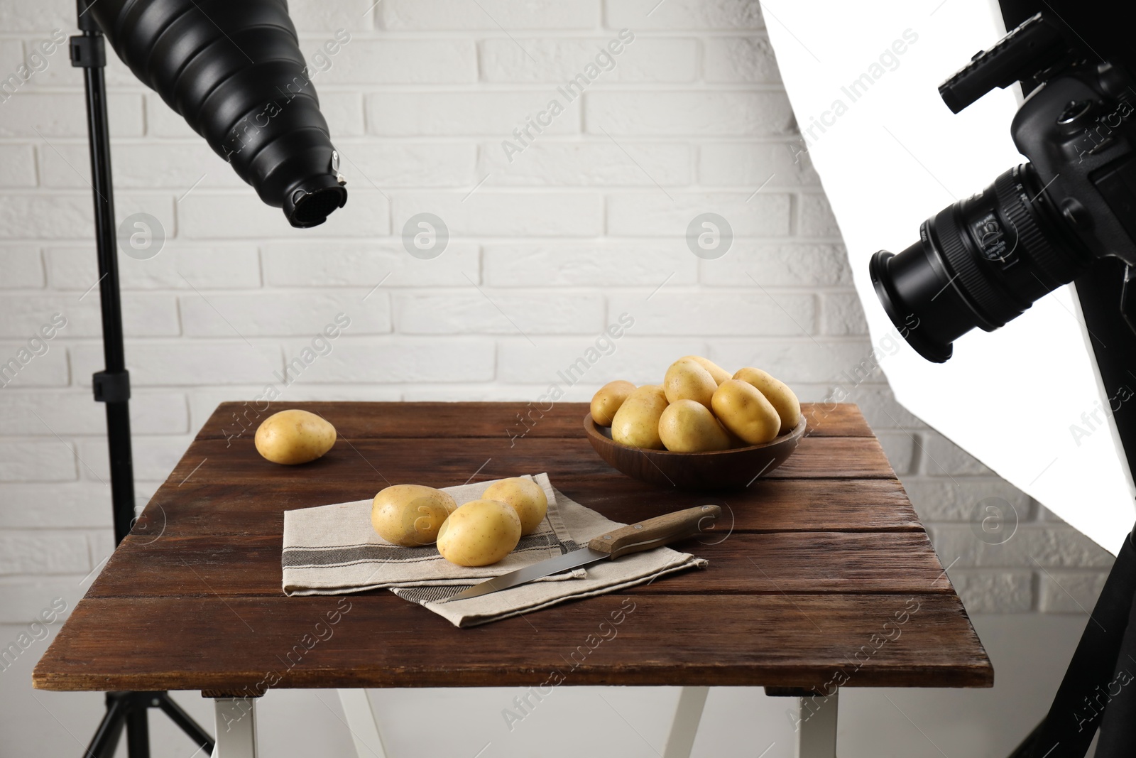 Photo of Shooting food in photo studio with professional lighting equipment