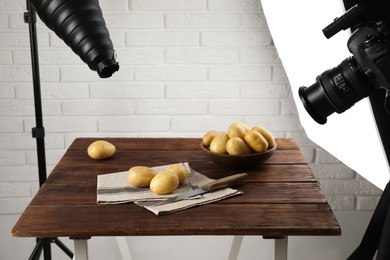 Photo of Shooting food in photo studio with professional lighting equipment