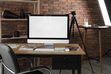 Photo of Shooting food in photo studio with professional equipment, focus on computer