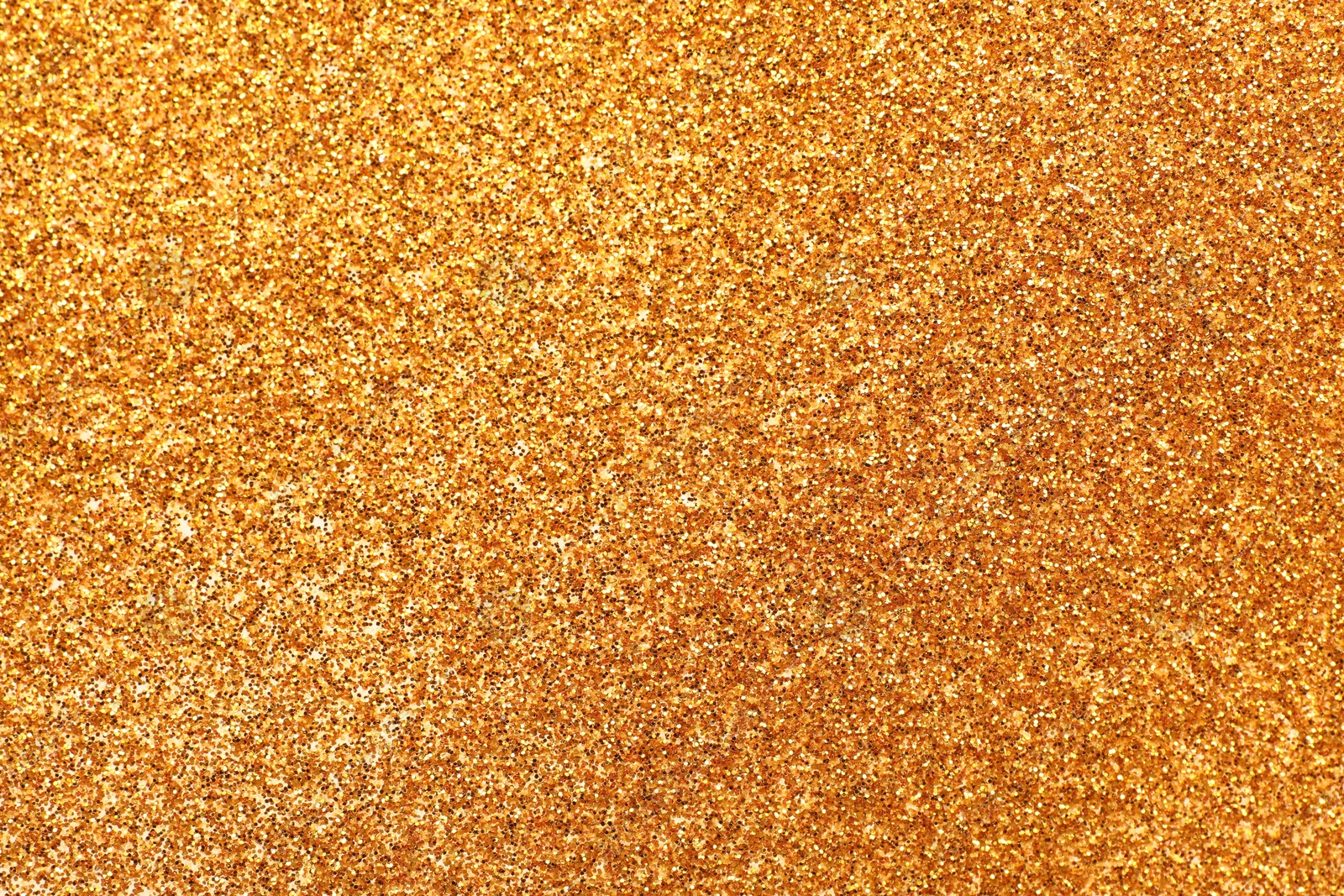 Photo of Shiny golden glitter as background, top view