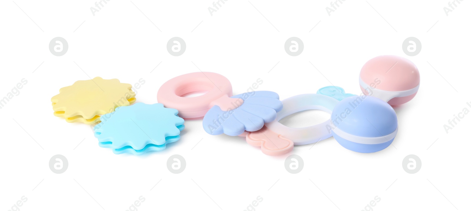 Photo of Colorful rattles isolated on white. Baby accessories