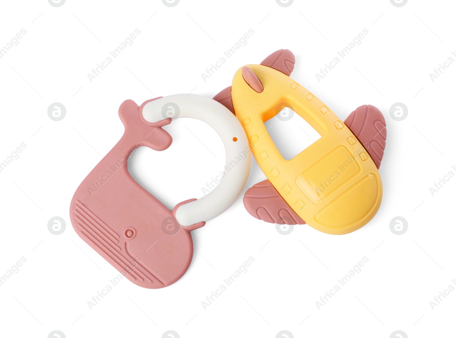 Photo of Colorful rattles isolated on white, top view. Baby accessories