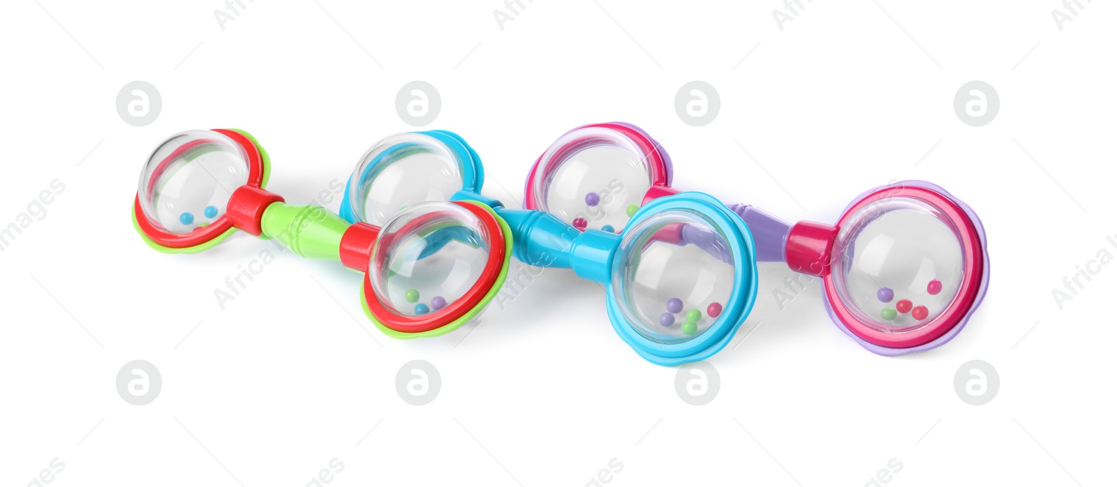 Photo of Colorful rattles isolated on white. Baby accessories