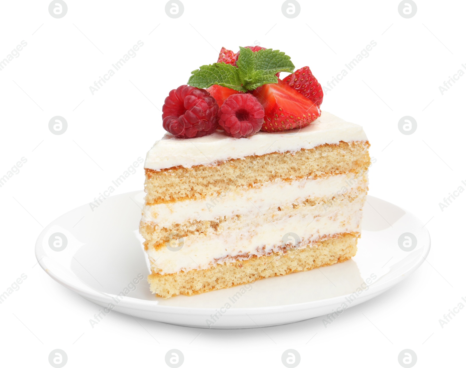 Photo of Piece of tasty sponge cake with fresh berries and mint isolated on white