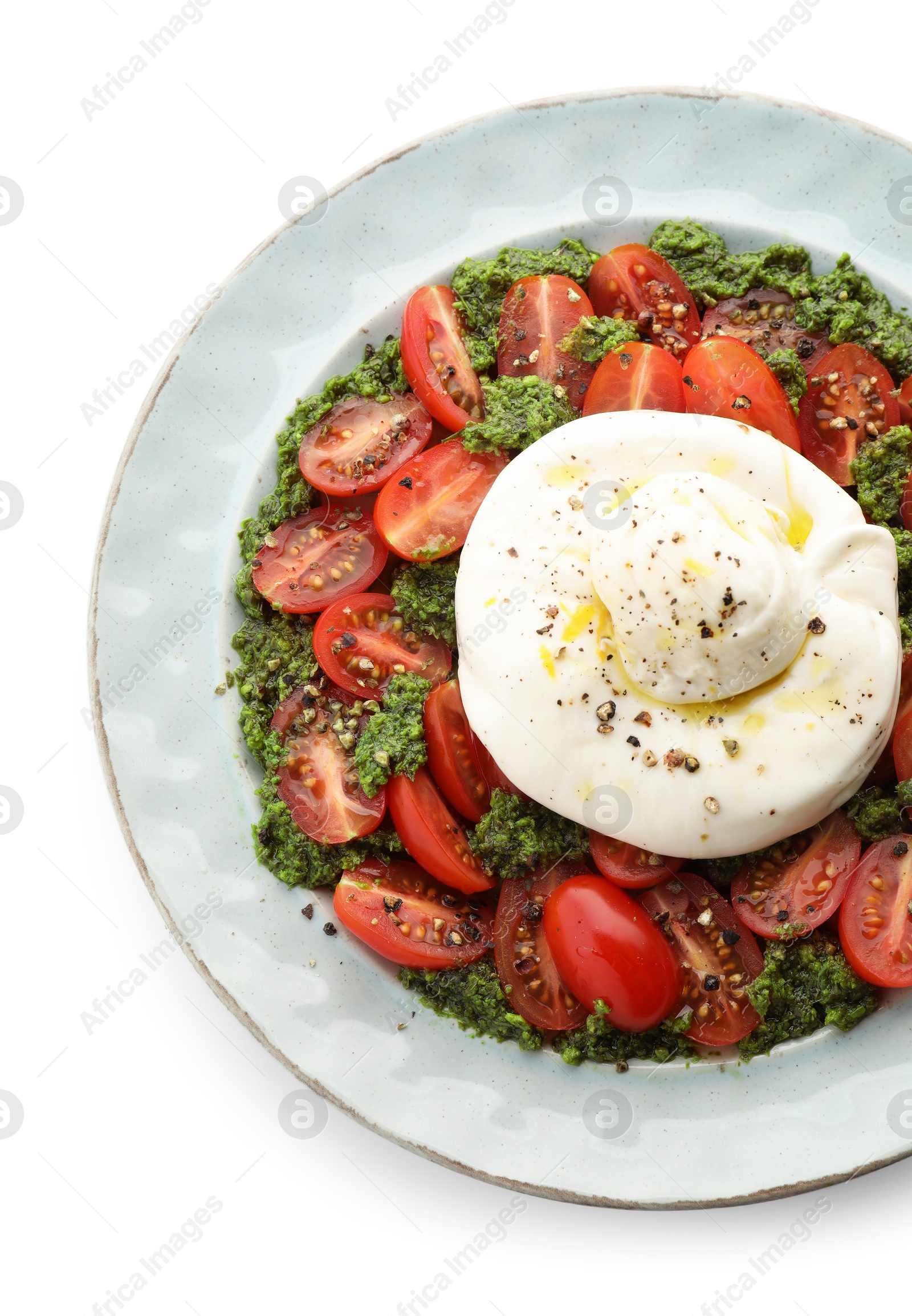 Photo of Fresh delicious burrata salad isolated on white, top view