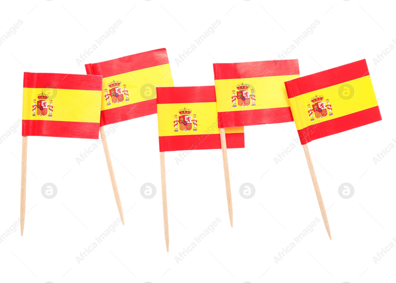 Photo of Small paper flags of Spain isolated on white