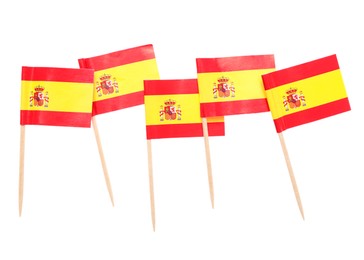 Small paper flags of Spain isolated on white