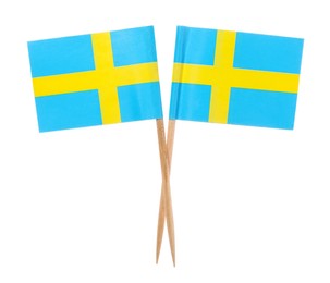 Small paper flags of Sweden isolated on white