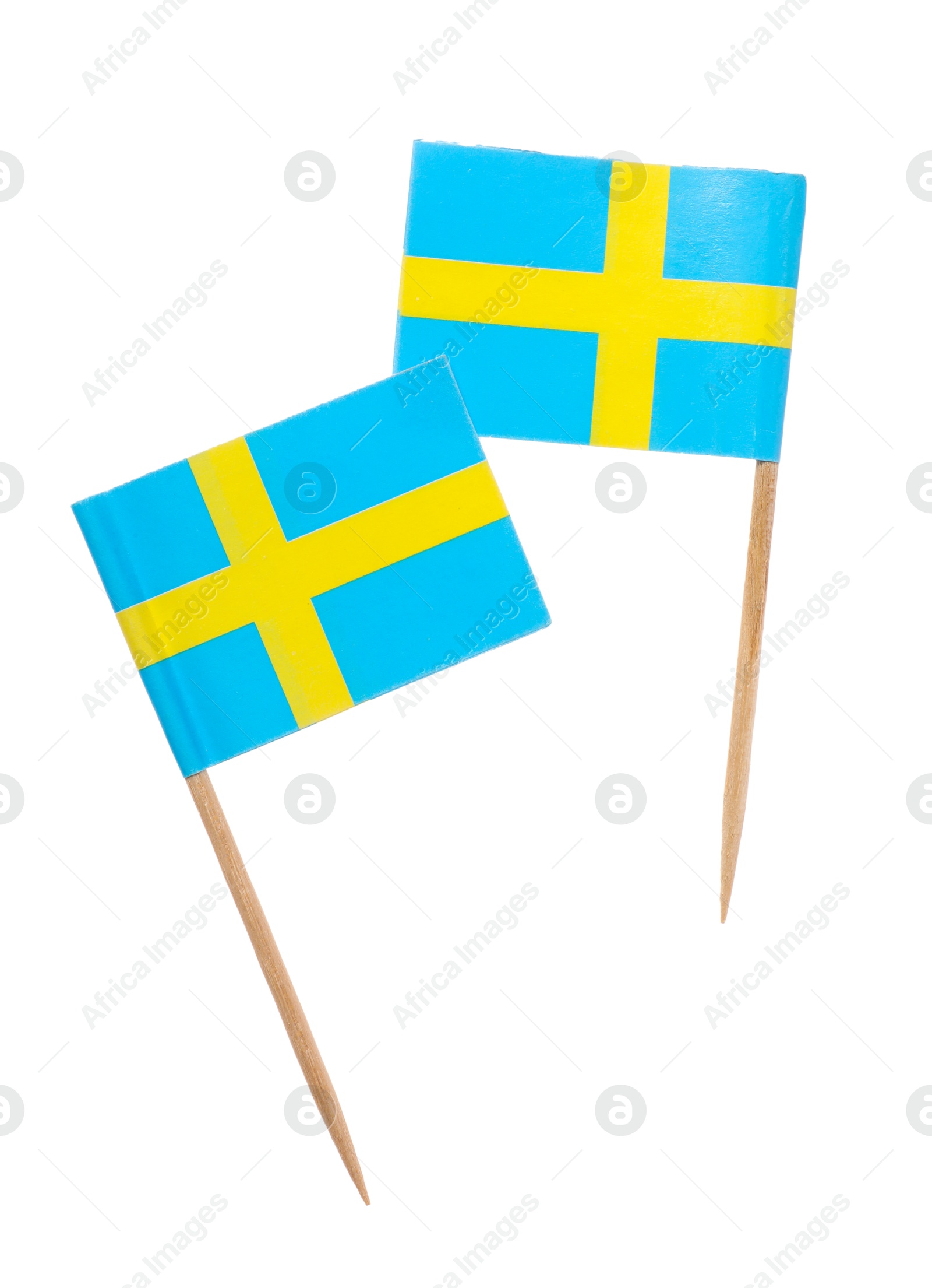 Photo of Small paper flags of Sweden isolated on white