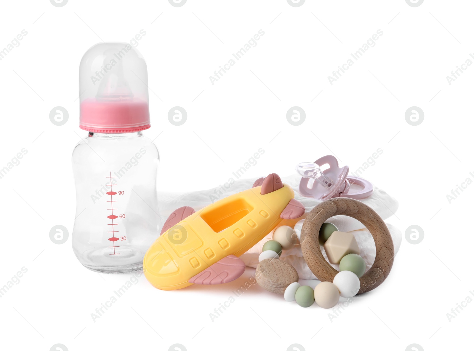 Photo of Baby accessories and rattle isolated on white