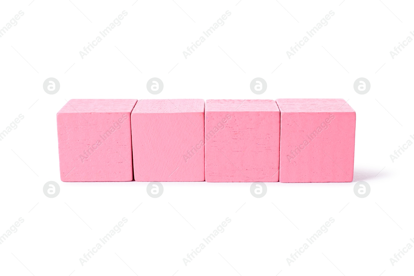 Photo of Many pink wooden cubes isolated on white