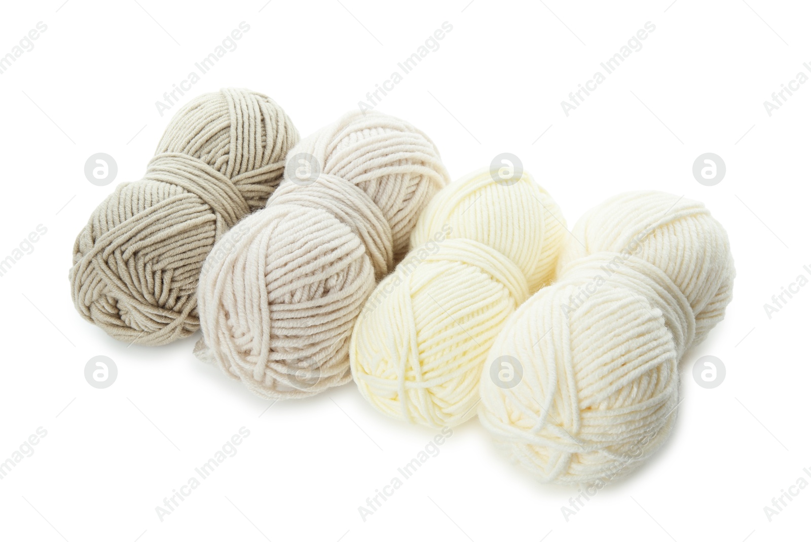 Photo of Skeins of soft yarn for knitting isolated on white