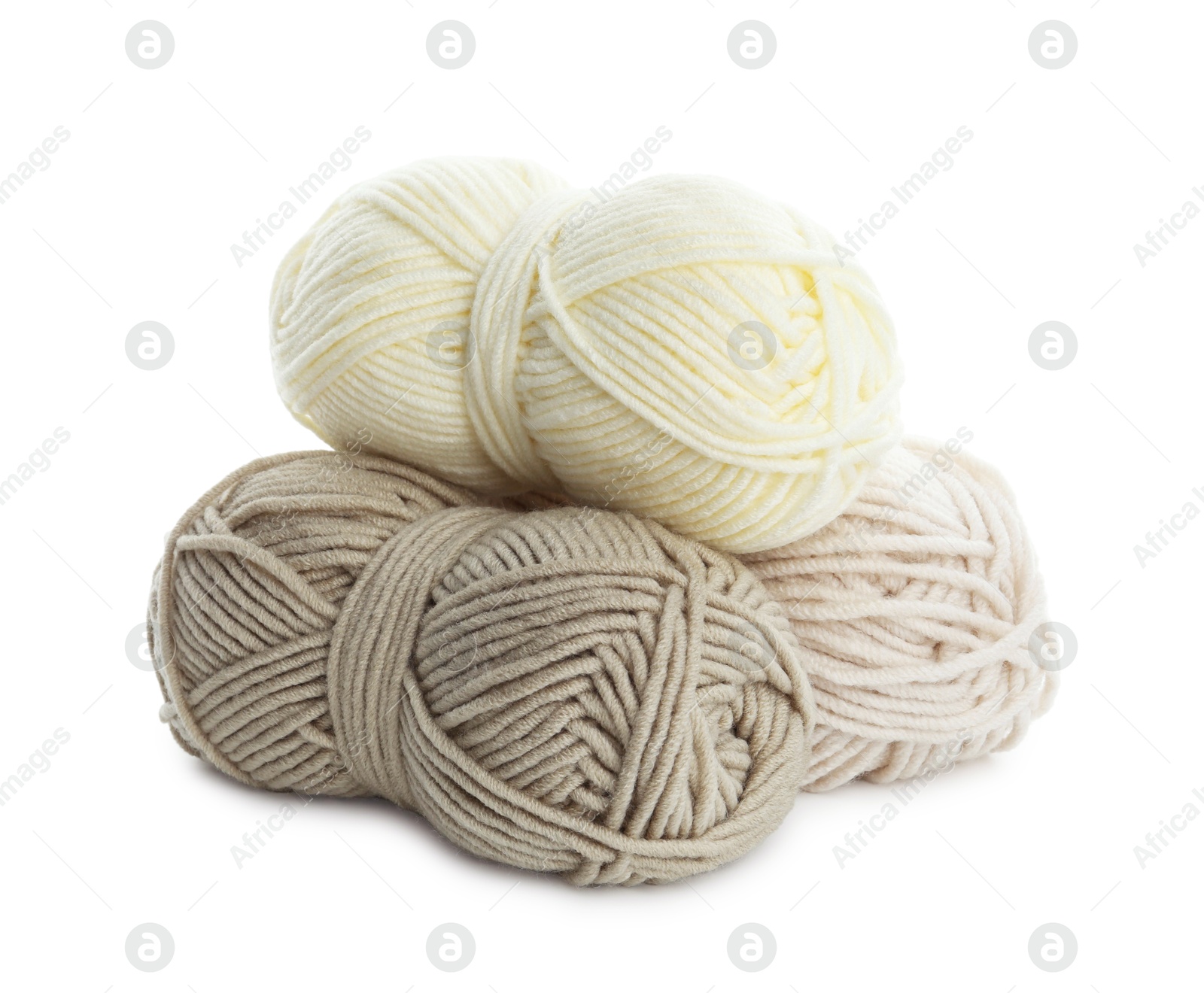 Photo of Skeins of soft yarn for knitting isolated on white