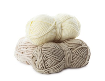 Photo of Skeins of soft yarn for knitting isolated on white