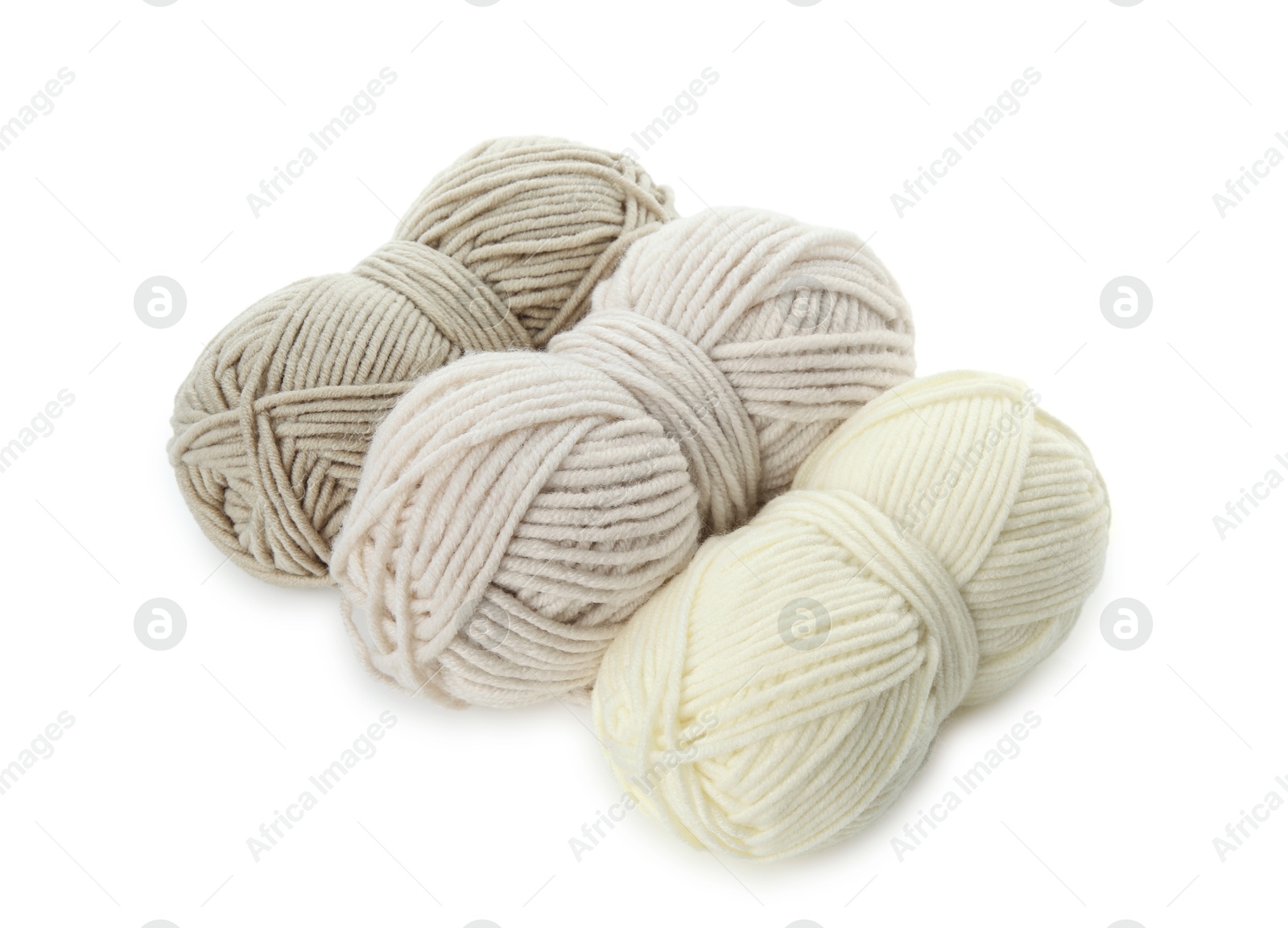 Photo of Skeins of soft yarn for knitting isolated on white