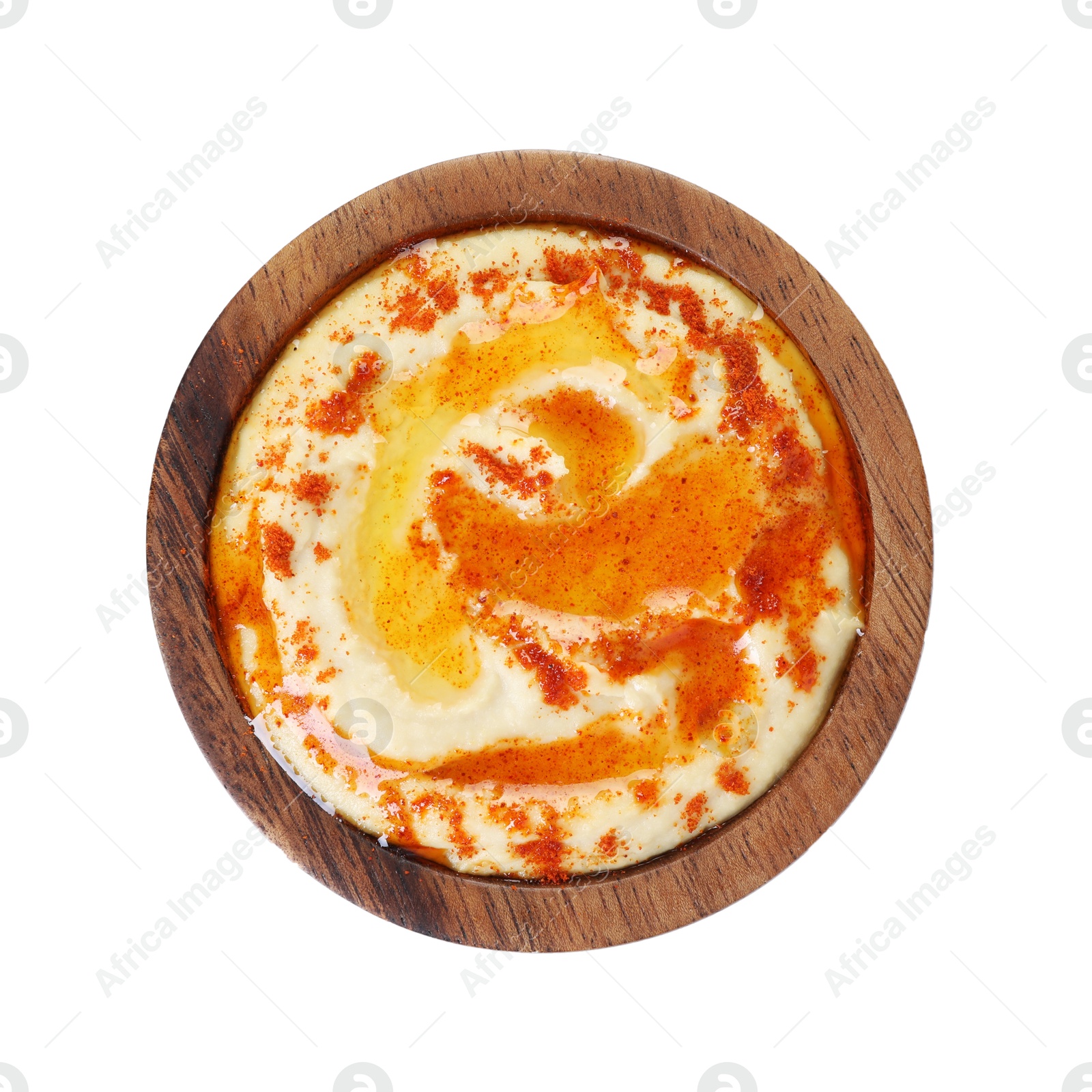 Photo of Delicious hummus with olive oil and paprika isolated on white, top view