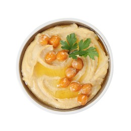 Photo of Delicious hummus with olive oil, chickpeas and parsley isolated on white, top view