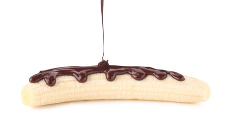 Photo of Pouring melted chocolate onto banana isolated on white