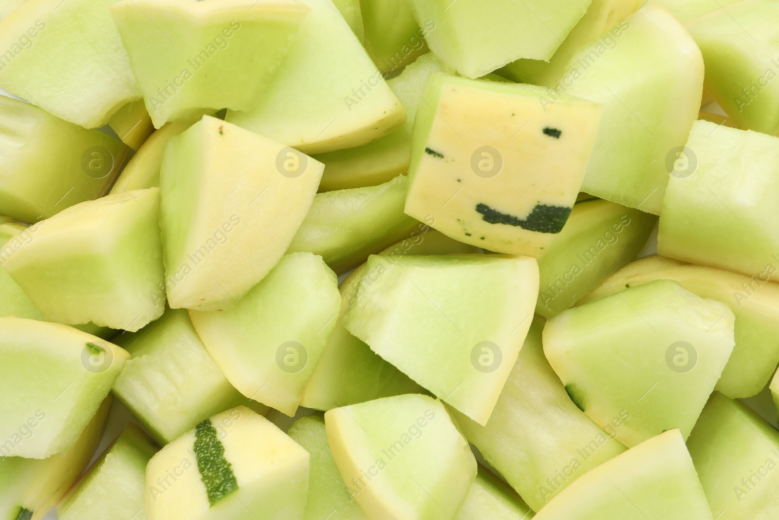 Photo of Many pieces of sweet honeydew melon, closeup