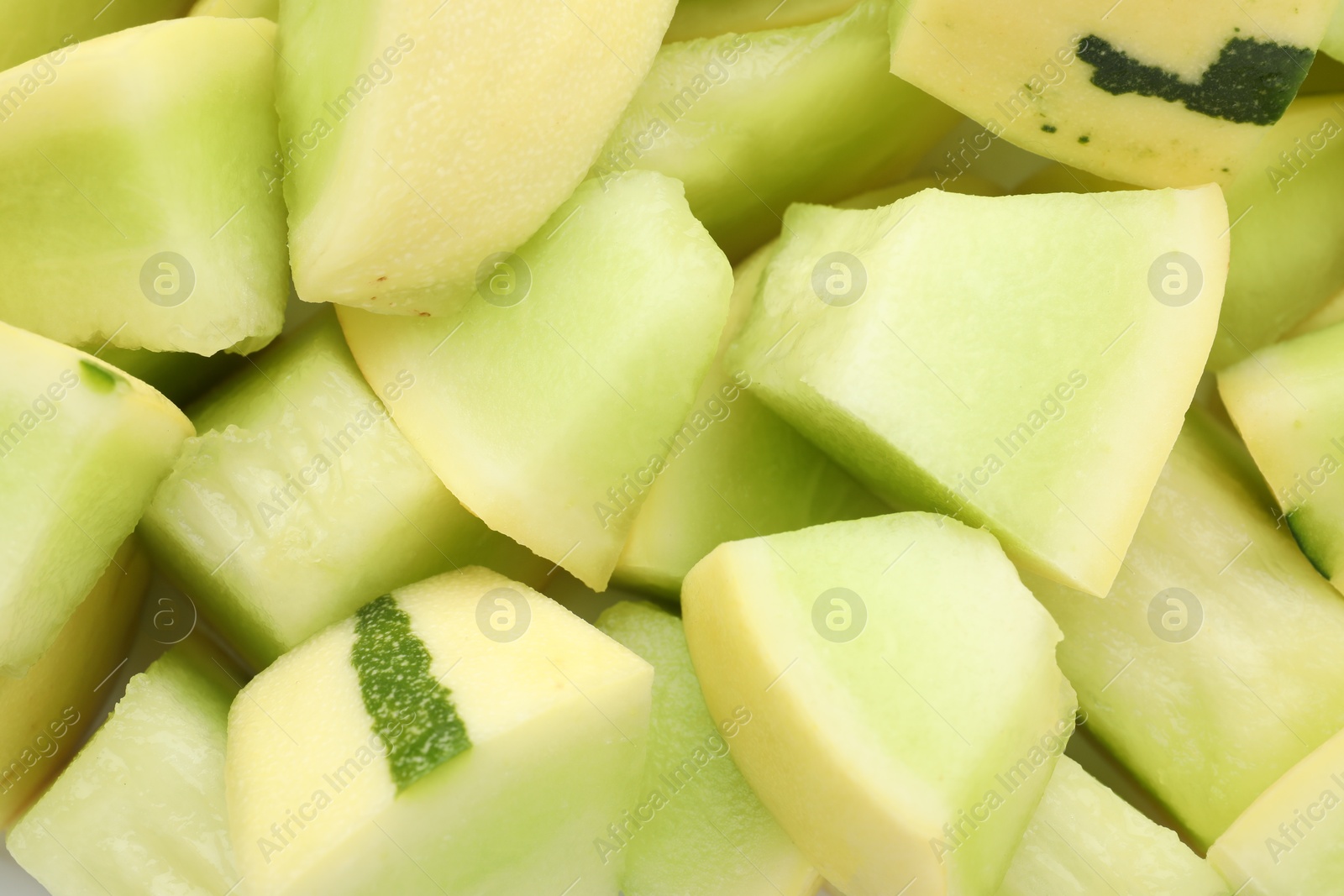 Photo of Many pieces of sweet honeydew melon, closeup